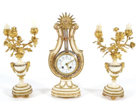 NINETEENTH-CENTURY ORMOLU MOUNTED MARBLE CLOCK GARNITUREThe lyre shaped clock with enamelled dial, flanked by a three light c