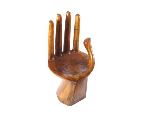 CARVED TREE TRUNK SEATin the form of a hand46 cm. diameter; 87 cm. high