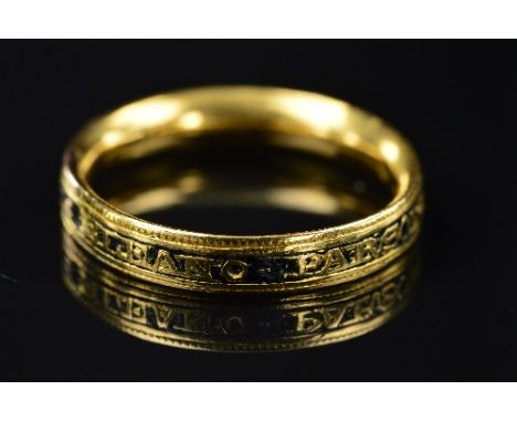A GEORGIAN BLACK ENAMEL AND GOLD MOURNING RING, central band inscribed 'ELEANO PARSONS. OB:22. JAN 1791 AE 53', ring size O, 
