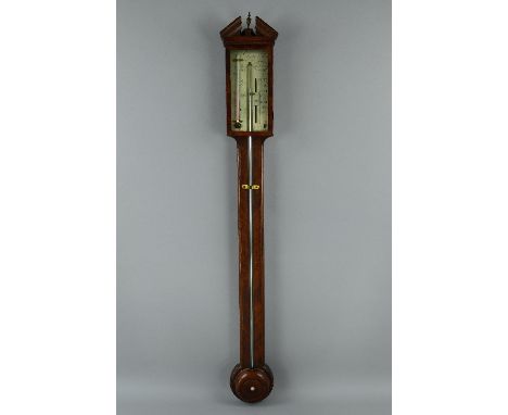 A GEORGE III MAHOGANY AND SATINWOOD BANDED STICK BAROMETER, brass urn finial between broken architectural pediment, the silve