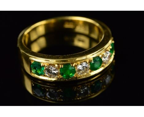 A MODERN EMERALD AND DIAMOND HALF ETERNITY RING, estimated modern round brilliant cut weight 0.36ct, colour assessed as J-K, 