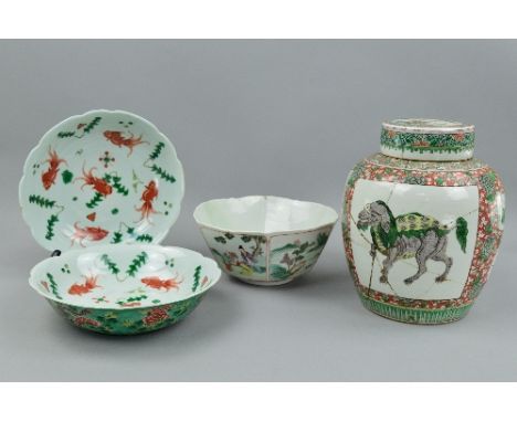A 19TH CENTURY FAMILLE VERTE SHAPED HEXAGONAL BOWL, wavy rim, painted with landscapes and figures in panels, character marks 