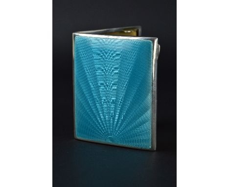 A GEORGE V SILVER AND TURQUOISE ENAMEL CIGARETTE CASE, of rectangular form, engine turned, gilt interior, makers mark T.W.L. 