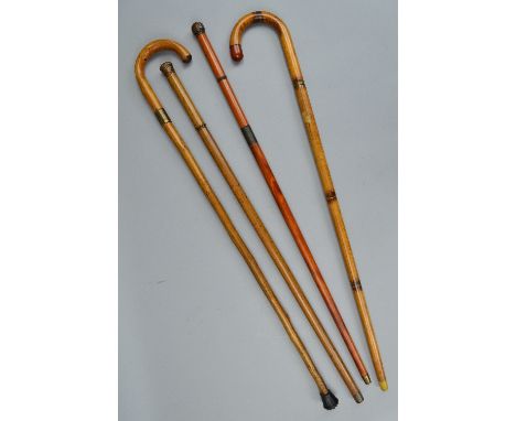 THREE LATE VICTORIAN/EARLY 20TH CENTURY NOVELTY WALKING STICKS/CANES, comprising a tipple stick fitted with glass and flask t