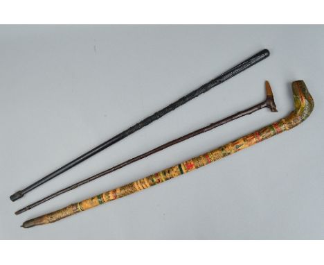 A NOVELTY AFRICAN WALKING STICK, with painted and overlaid bark decoration, the handle in the form of a snake, length approxi