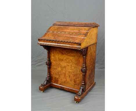 A VICTORIAN BURR WALNUT AND INLAID PIANO TOP DAVENPORT, fitted with a rising mechanism, back opening to reveal fret cut stati