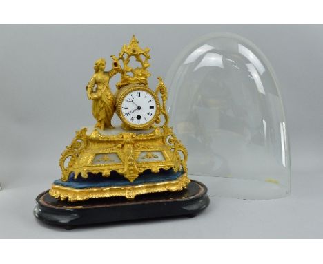 A 19TH CENTURY GILT METAL AND ALABASTER FIGURAL MANTEL CLOCK, cast with a girl holding a bird cage beside a circular white en