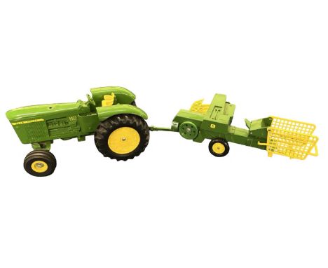 An ERTL 1:32 scale John Deere  5020 Diesel tractor and baler