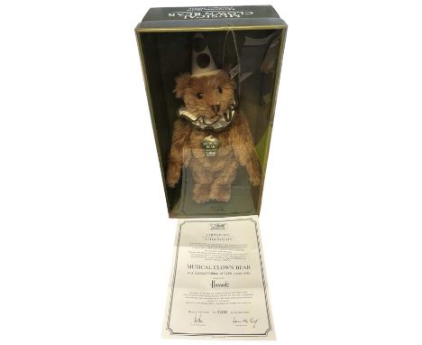 A boxed Steiff (for Harrods) limited edition Musical Clown Bear.#1230/2000 with COA