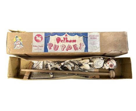 A boxed SL Skeleton Pelham Puppet