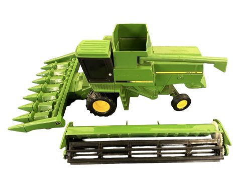 An ERTL 1:32 scale John Deere  Titan II Combine Harvester