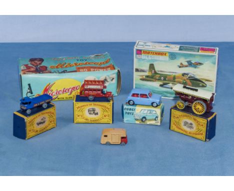 Four Lledo models of yesteryear die cast vehicles, Corgi Morris Mini Minor 226, Matchbox kit and a microscope