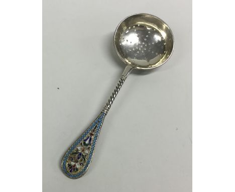 A good quality Russian silver and enamel sifter spoon with twisted handle. Approx. 50 grams. Est. £250 - £350.