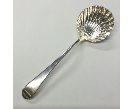 An 18th Century Georgian shell shaped sauce ladle. London 1790. By Richard Evans. Approx. 43 grams. Est. £35 - £45.