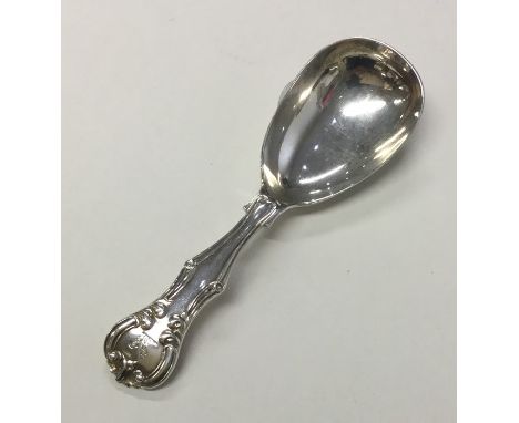 EXETER: A good large silver caddy spoon. By Williams. Approx. 31 grams. Est. £40 - £60.