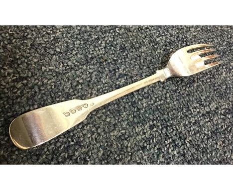 PAUL STORR: A silver fiddle pattern dessert fork. London. Approx. 43 grams. Est. £50 - £80.