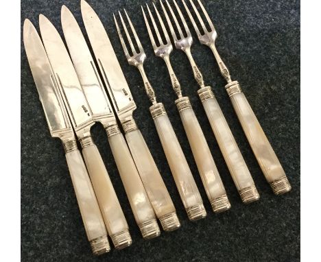 PAUL STORR: A set of four silver and MOP dessert knives together with four matched silver forks. London. Approx. 336 grams. E