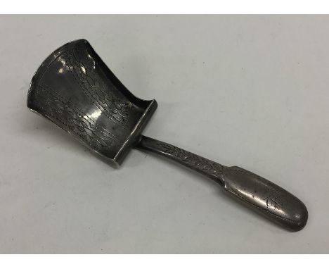 A good Georgian silver caddy scoop with bright cut decoration. Birmingham. Approx. 9.3 grams. Est. £30 - 350.