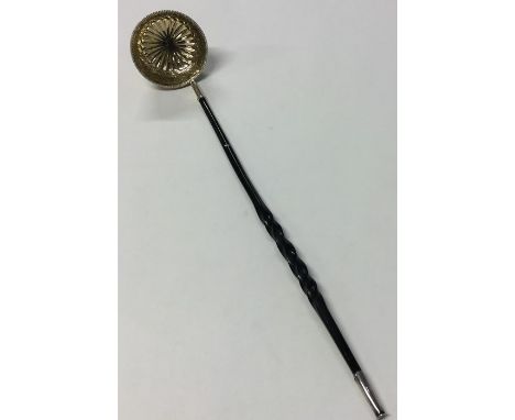A rare Antique silver toddy ladle with gilt bowl together with whalebone handle. Approx. 61 grams. Est. £45 - £55.