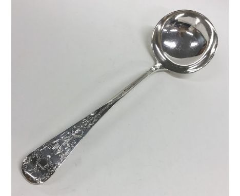 A good quality bright cut silver soup ladle. London. By GA. Approx. 226 grams. Est. £200 - £300.