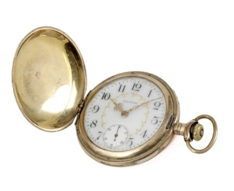 Waltham. Reloj de bolsillo norteamericano circa 1900-1909. De tres tapas en oro de 14 k., esfera en porcelana blanca con guir