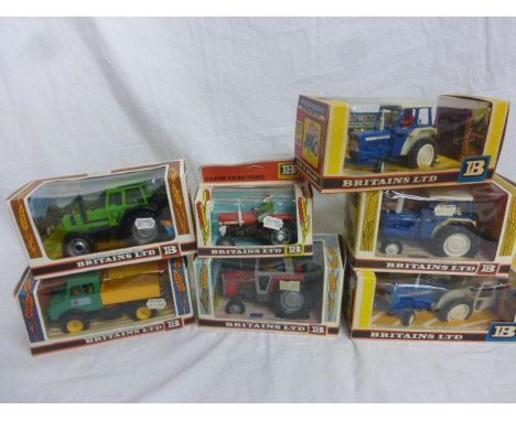 Seven 1970's Boxed Britains Tractors - Massey Ferguson 9522, Unimog Tractor Lorry 9569, Ford 5000 9527, Deutz 9526, Ford 9524