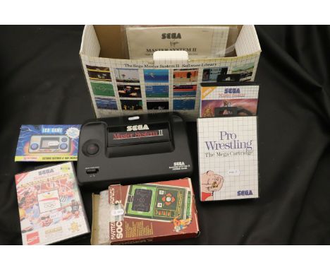 Retro Gaming - Boxed Systema Back to the Future III LCD handheld game, a boxed Mattel Electronics Soccer 2 and a boxed Sega M