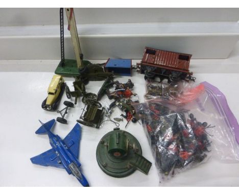 Group of toys to include Astra spot light, metal soldiers and figures, Dinky vehicles etc