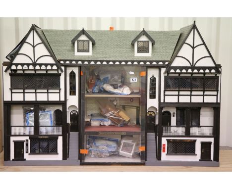 1:12 scale Cavendish dolls house with family built over 10 years by Treasure Dolls of Formby, approx. 49 inches in length, op