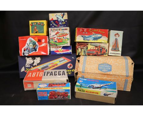 A selection of 12 boxed tin toys, clockwork,friction etc, several countries of manufacture, to include boat, helicopter, trai