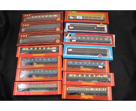 14 Boxed OO gauge coaches and cars to include Hornby x 7, Triang/Hornby x 1, Airfix x 4, Lima x 1 and Bachmann x 1
