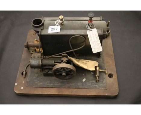 Stuart Turner Stationary Steam Engine, well used, on wooden base that measures 30 x 35cm