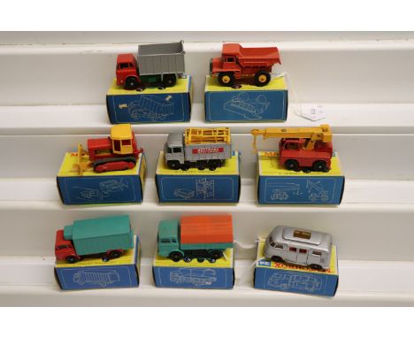 Eight boxed Matchbox 75 Series commercial diecast models to include 28 Mack Dump Truck, Refrigerator Truck, 42 Iron Fiary Cra