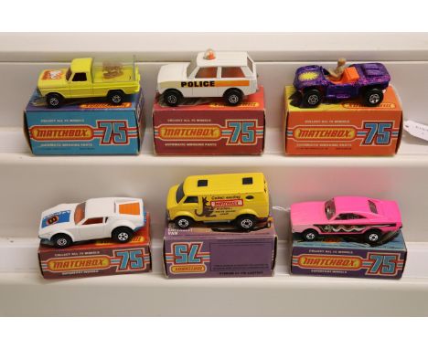 Six boxed Matchbox 75 Series models to include Rolamatix x 3 (47 Beach Hopper in purple, 57 Wild Life Truck & 20 Police Patro