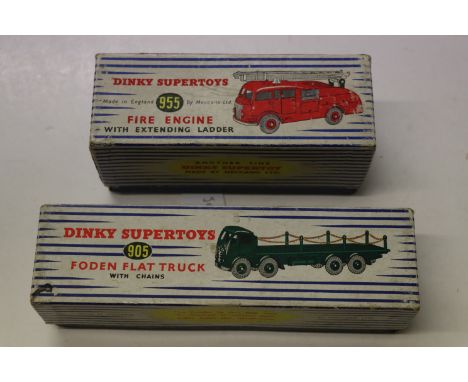 Two boxed Dinky Supertoys to include 905 Foden Flat Truck in maroon with red hubs and 955 Fire Engine, both showing play wear