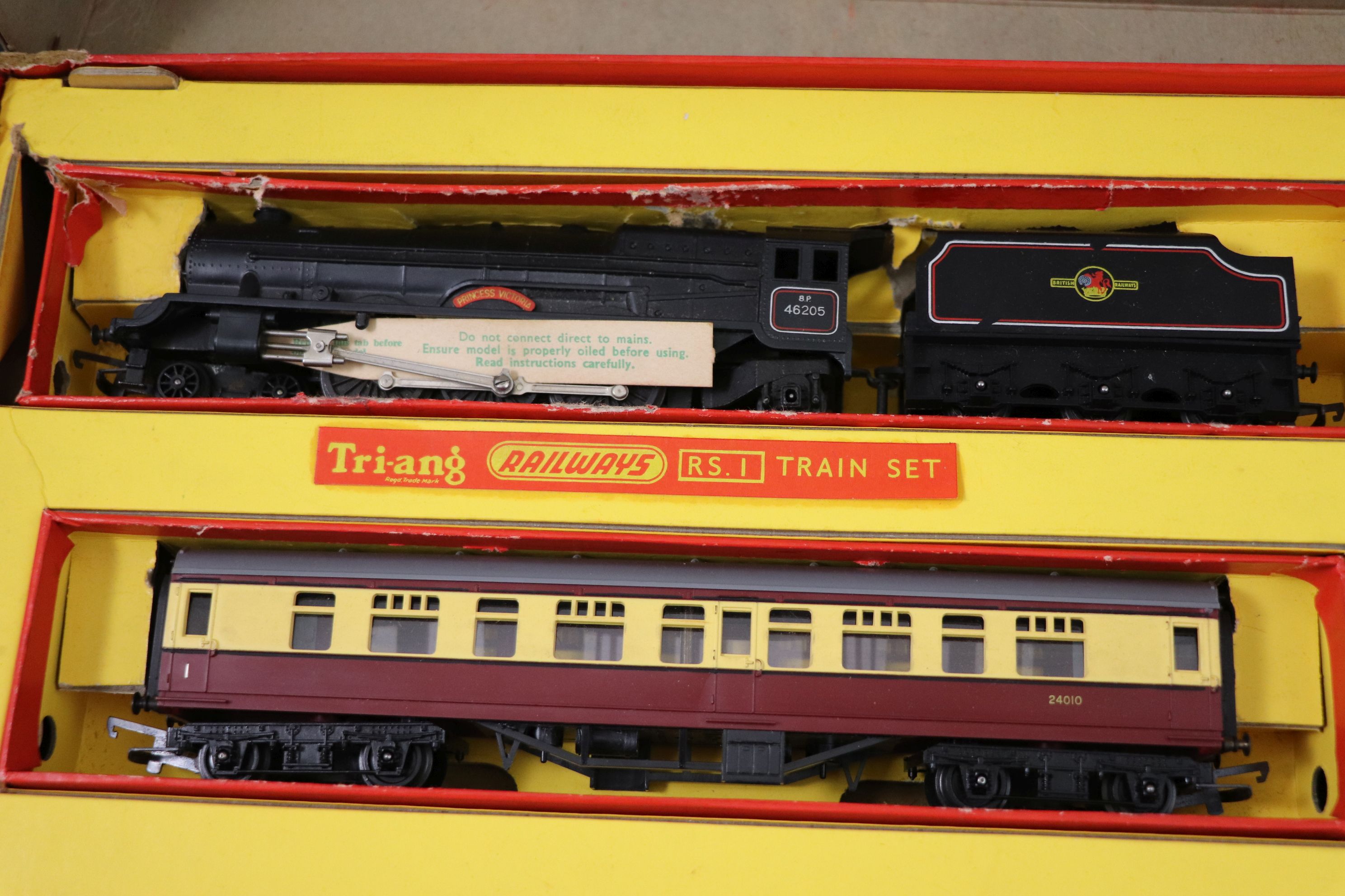 Three boxed Triang OO gauge model railway train sets to include RS24