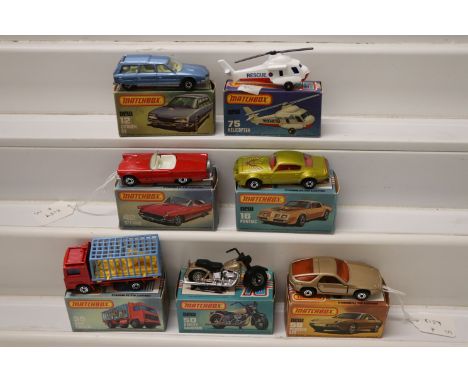 Seven boxed Matchbox 75 Series models to include 59 Harley Davidson, 42 '57 T-Ford in red, 35 Zoo Truck (complete), 59 Porsch