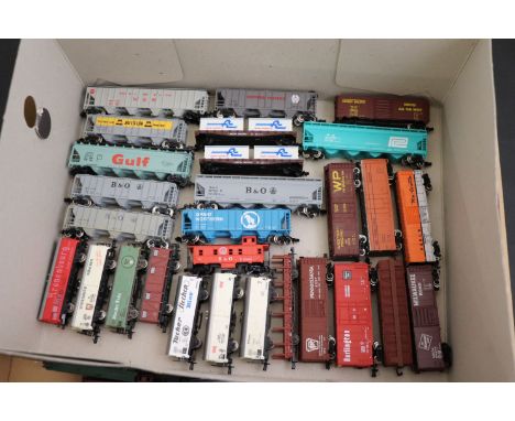 Over 70 N gauge model railway items of rolling stock all American or Continental railways featuring Bachmann, Lima, Rapido, e
