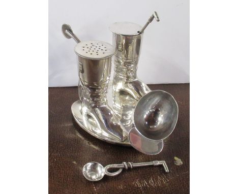 A Victorian silver plated cruet, formed as two hunting boots