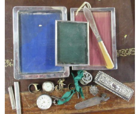 A collection of silver items, to include frames