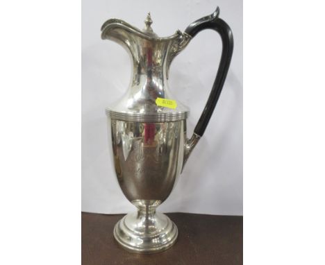 A silver water jug, engraved with initials and date to both sides, London 1906, weight 21oz all in