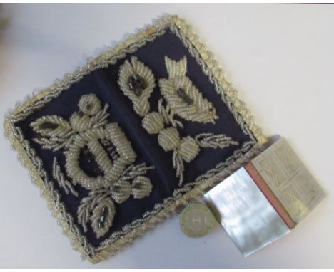 Three Victorian needle cases, one with raised bead work decoration, the other two in mother of pearl