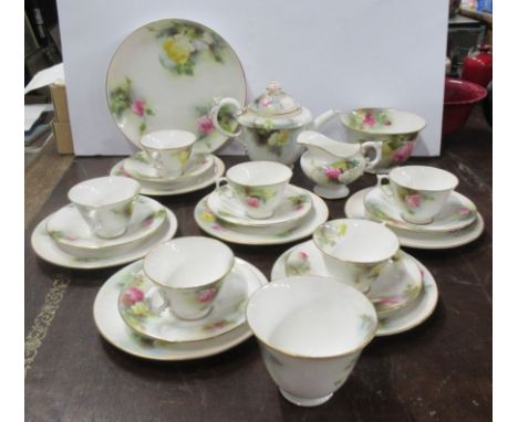 A Royal Worcester tea set, comprising a tea pot, jug, two bowls, a plate, six cups, six saucers and six side plates, all deco