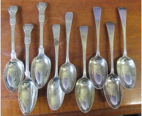 A set of four Georgian silver serving spoons, engraved with an initial, together with two other Georgian silver serving spoon