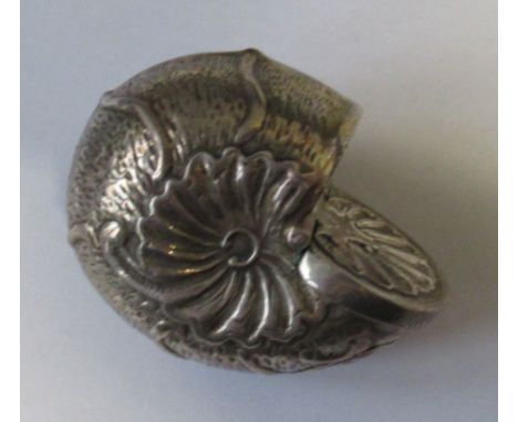 A silver conch shell, with hinged cover, marked 925