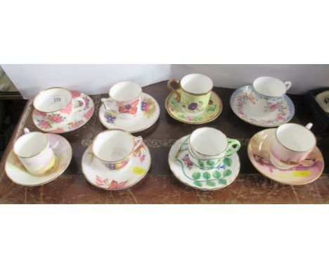 Eight Royal Worcester cabinet cups and saucers