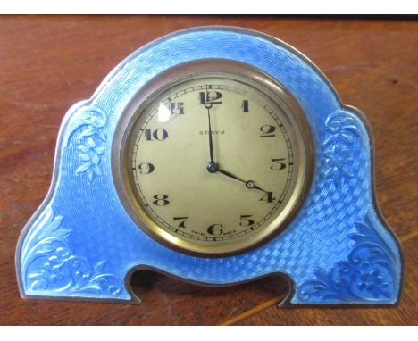 A silver and enamel clock, decorated with blue enamel, Chester circa 1939