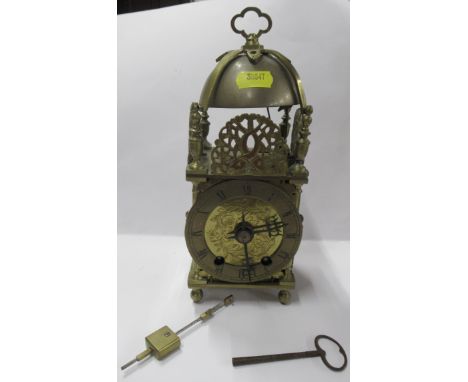 A late 19th/early 20th century brass cased lantern clock, height 9.5ins