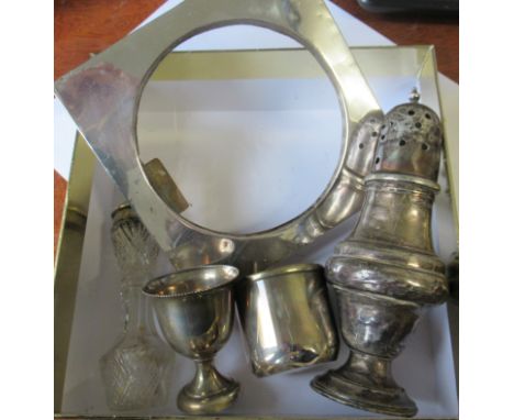 A silver sugar caster, together with an egg cup and cup, weight 4oz, together with a silver mounted photograph frame and a gl