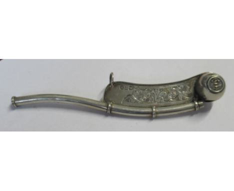 A silver bosons whistle, with engraved decoration